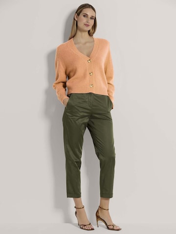 MADELEINE Gebreid vest in Oranje