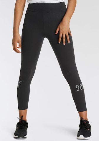 PUMA Skinny Leggings in Black: front