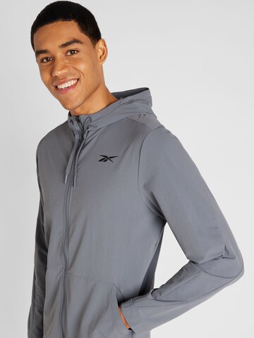 Reebok - Chaqueta de chándal en gris