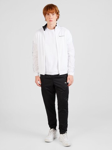 Champion Authentic Athletic Apparel Tracksuit in White