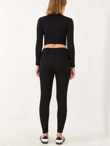 Pantalons de tailleur Bianco Lucci en noir