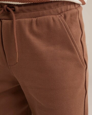 regular Pantaloni di WE Fashion in marrone