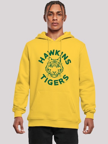 F4NT4STIC Sweatshirt 'Stranger Things Hawkins Tigers Netflix TV Series' in Gelb