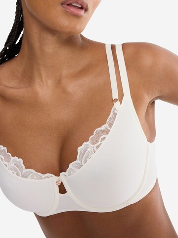 TRIUMPH Minimizer BH 'Florale Wild Gardenia' in Beige