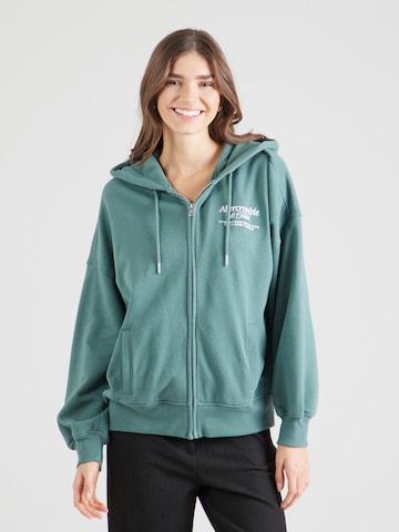 Abercrombie & Fitch Zip-Up Hoodie 'LONG LIFE' in Green: front