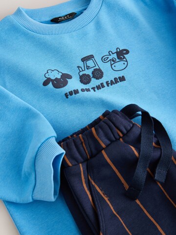 Next - Ropa para correr en azul