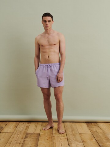 DAN FOX APPAREL Regular Swimming shorts 'Yigit' in Purple: front