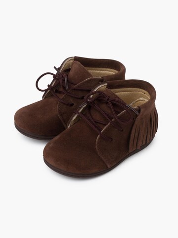 Pisamonas - Botas en marrón