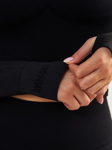 BeShaped Funktionsshirt 'Power Up!' in Schwarz