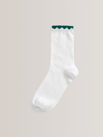Next Sockor i vit