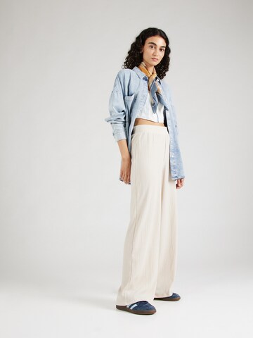 Loosefit Pantaloni 'Emina' di ABOUT YOU in beige