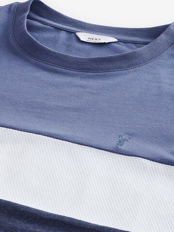 T-Shirt Next en bleu