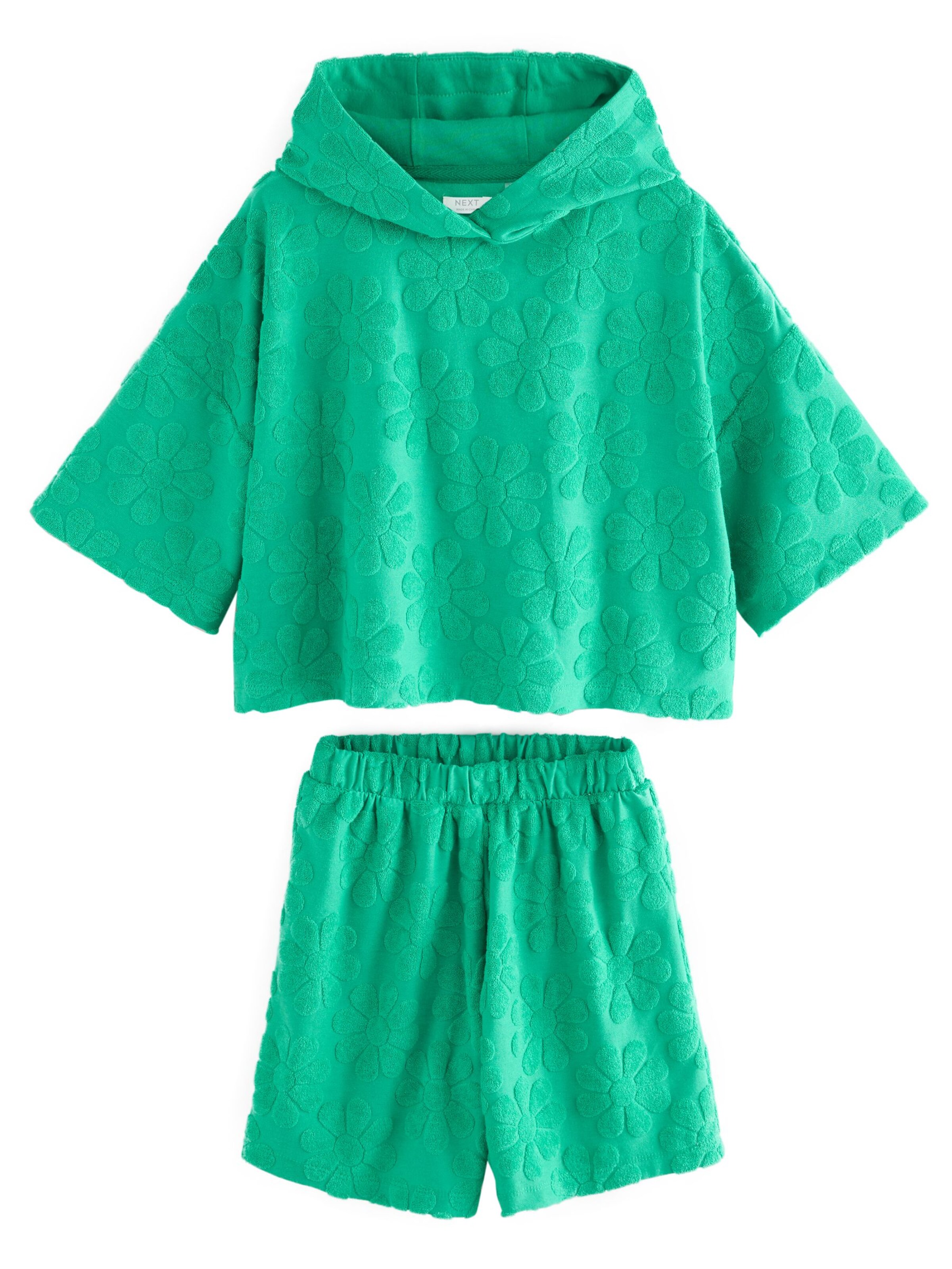 Next Set i grön: framsida