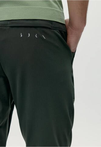 Born Living Yoga Tapered Trousers 'Tiber' in Green