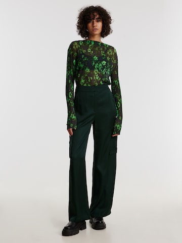 EDITED Szeroka nogawka Spodnie 'Malena' w kolorze zielony