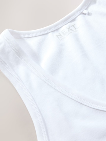 Next - Top en blanco