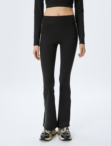 Koton Tapered Leggings in Black: front