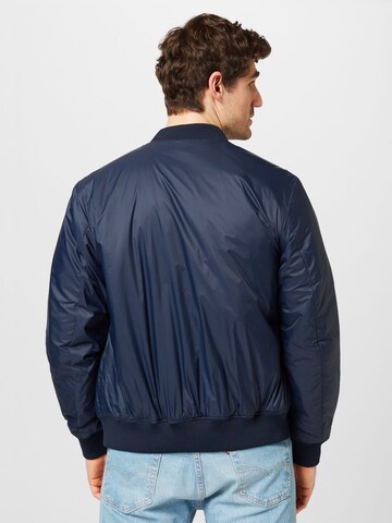 Champion Authentic Athletic Apparel Between-Season Jacket in Blue