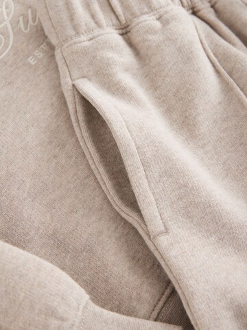 Superdry & Co - Conjunto en beige