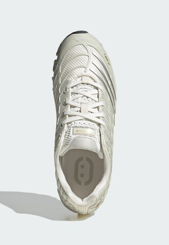 Baskets basses 'Megeride F50' ADIDAS ORIGINALS en blanc