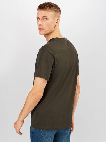 Regular fit Tricou 'Club' de la Nike Sportswear pe verde