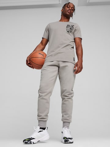 PUMA Λειτουργικό μπλουζάκι 'The Hooper' σε γκρι