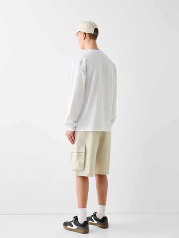 Bershka Regular Shorts in Beige