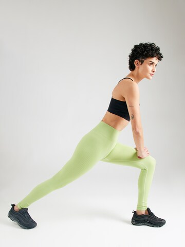 Skinny Pantalon de sport 4F en vert