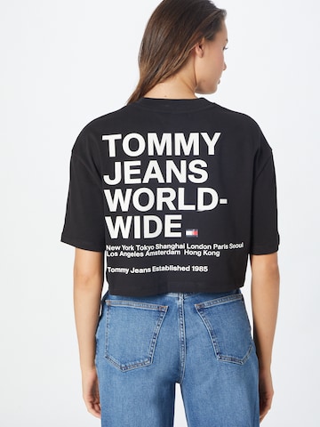 Tommy Jeans Paita 'WORLDWIDE' värissä musta
