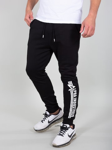 Effilé Pantalon ALPHA INDUSTRIES en noir : devant