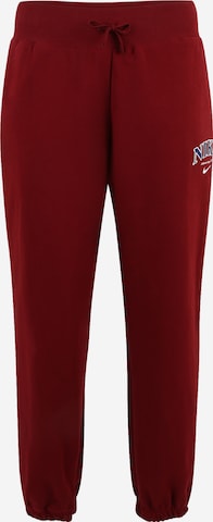 Nike Sportswear Tapered Trousers in Red: front