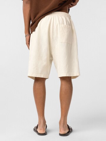 Dandalo Loose fit Trousers in Beige