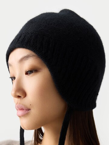 GOBI Cashmere - Sombrero 'Ultimate Warmth Knit Tie Hat' en negro