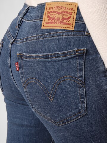 LEVI'S ® Tapered Jeans 'Mid Rise Boyfriend' i blå