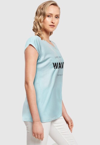 T-shirt 'Summer - Life is a wave' Merchcode en bleu