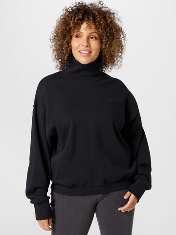 Reebok Sweatshirt in Black: front