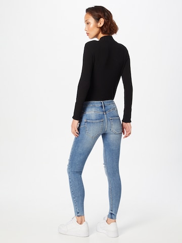 River Island Skinny Jeans 'Molly' in Blau