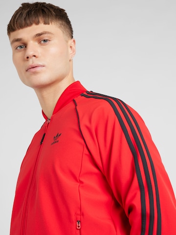 ADIDAS ORIGINALS Sweatjacka i röd