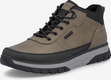 Bottes à lacets Rieker en beige : devant