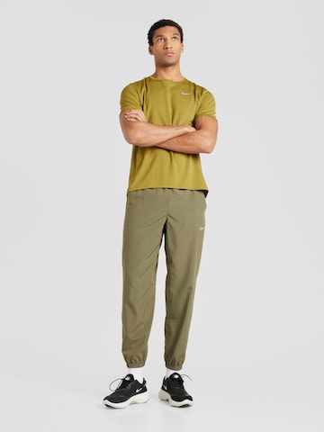 NIKE Performance shirt 'MILER' in Green