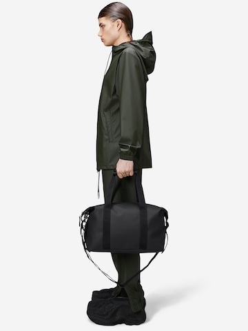 RAINS Weekend bag Hilo in Black ABOUT YOU