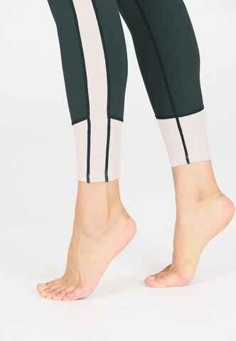Athlecia Skinny Sports trousers 'Aspasia' in Green
