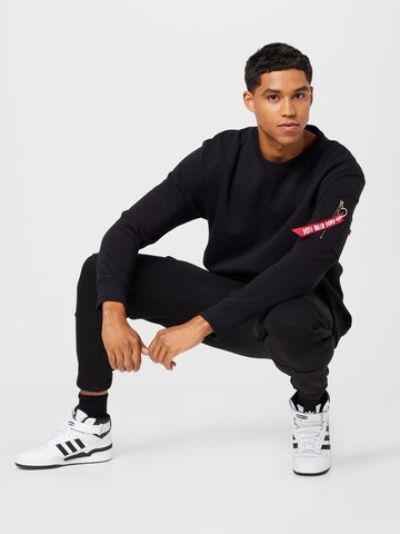 ALPHA INDUSTRIES Sweatshirt in Zwart