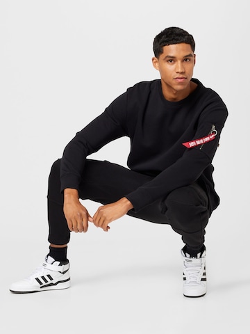 ALPHA INDUSTRIES Sweatshirt in Schwarz