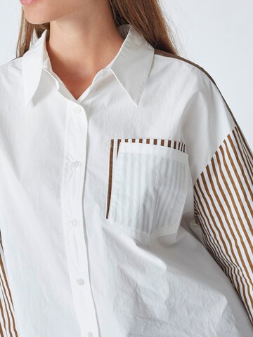 Chemisier 'Mio' co'couture en marron