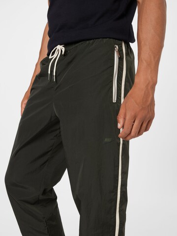 Effilé Pantalon Nike Sportswear en vert