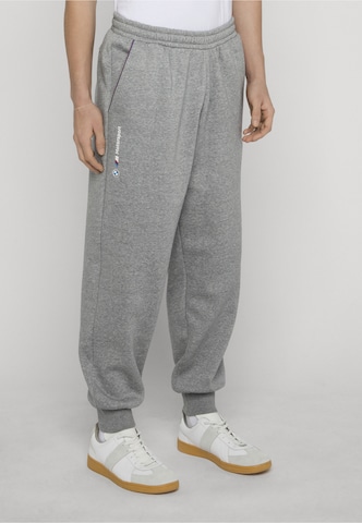 PUMA - Tapered Calças de desporto 'BMW MMS Essential+' em cinzento: frente