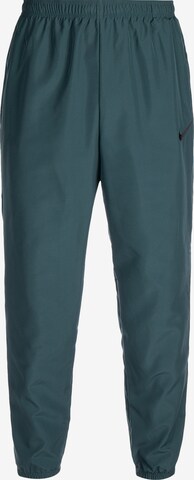 NIKE Regular Workout Pants 'Academy' in Green: front