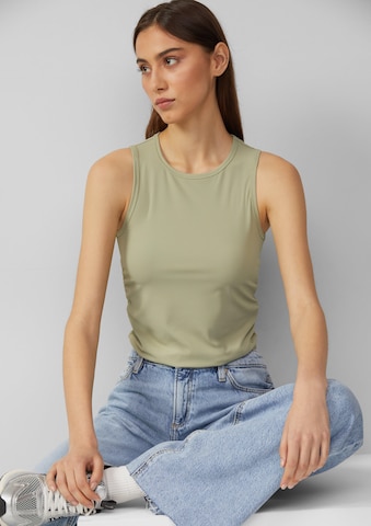Haut QS en vert
