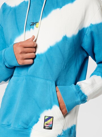 Sweat-shirt Reebok en bleu